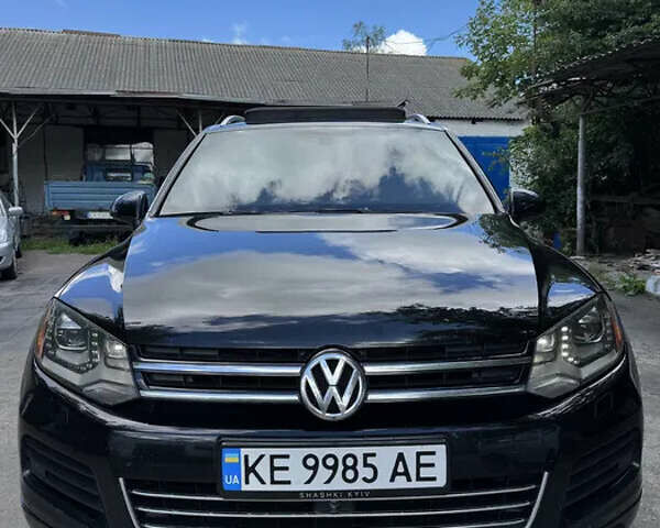 Чорний Фольксваген Туарег, об'ємом двигуна 2.97 л та пробігом 325 тис. км за 18000 $, фото 1 на Automoto.ua