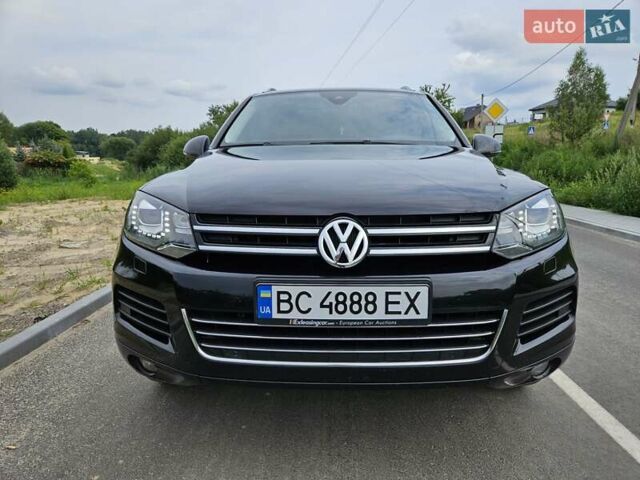 Черный Фольксваген Туарег, объемом двигателя 3 л и пробегом 236 тыс. км за 21600 $, фото 1 на Automoto.ua
