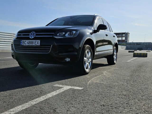 Черный Фольксваген Туарег, объемом двигателя 3 л и пробегом 236 тыс. км за 19800 $, фото 1 на Automoto.ua