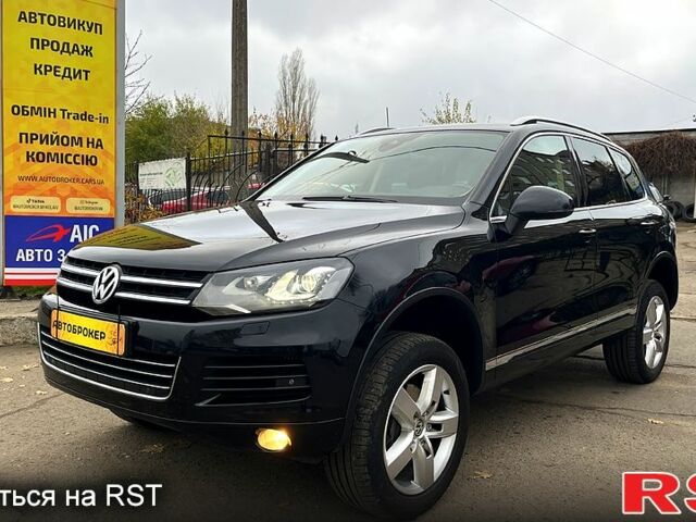 Черный Фольксваген Туарег, объемом двигателя 3 л и пробегом 239 тыс. км за 23500 $, фото 1 на Automoto.ua