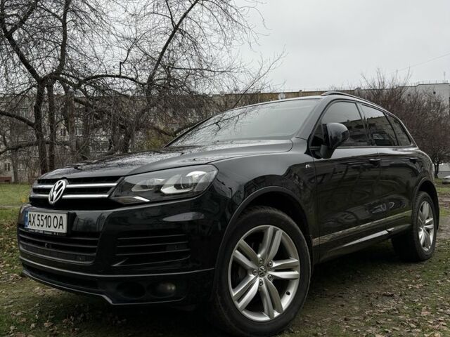 Черный Фольксваген Туарег, объемом двигателя 3 л и пробегом 250 тыс. км за 25000 $, фото 1 на Automoto.ua