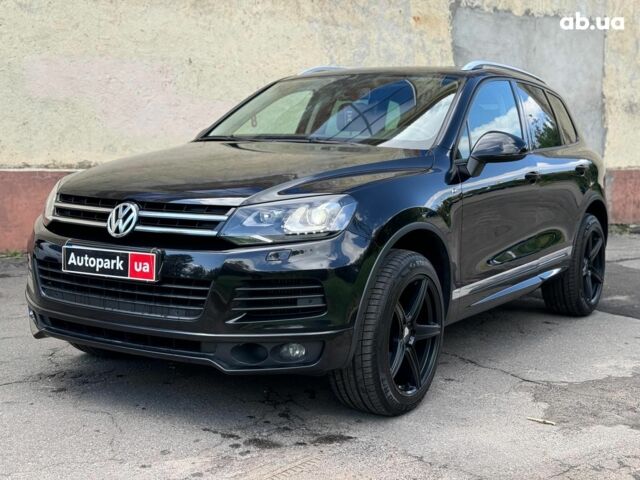 Черный Фольксваген Туарег, объемом двигателя 3 л и пробегом 200 тыс. км за 25790 $, фото 1 на Automoto.ua