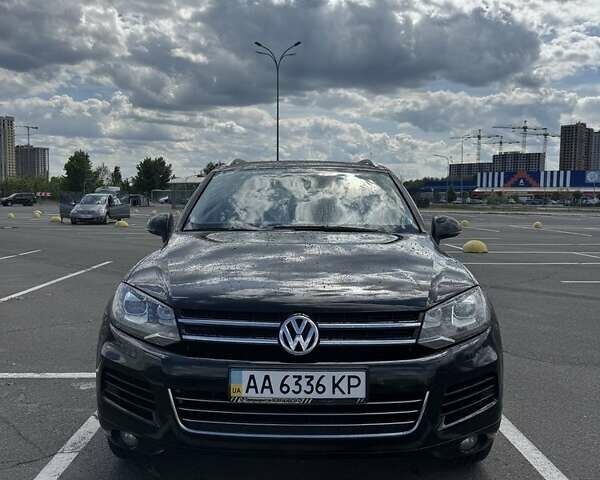 Чорний Фольксваген Туарег, об'ємом двигуна 3 л та пробігом 195 тис. км за 20950 $, фото 1 на Automoto.ua