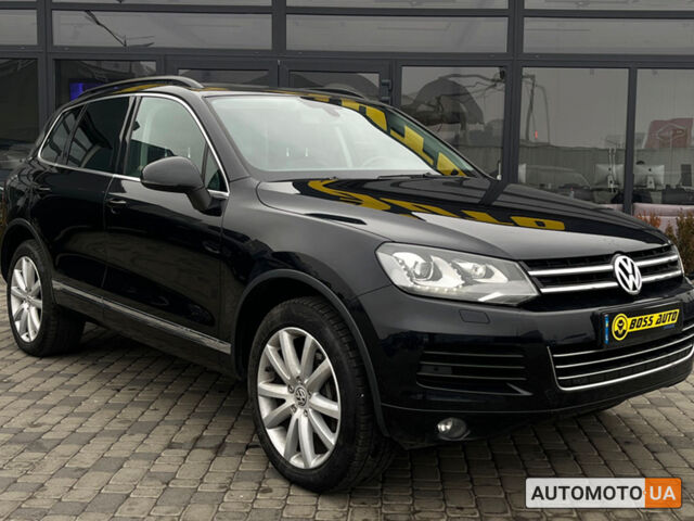 Чорний Фольксваген Туарег, об'ємом двигуна 3 л та пробігом 272 тис. км за 22990 $, фото 1 на Automoto.ua