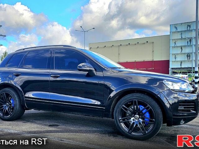 Черный Фольксваген Туарег, объемом двигателя 4.2 л и пробегом 330 тыс. км за 19999 $, фото 1 на Automoto.ua