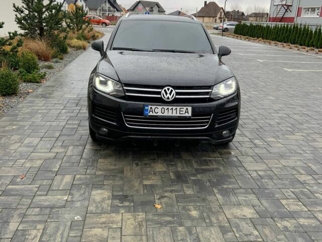 Черный Фольксваген Туарег, объемом двигателя 3 л и пробегом 345 тыс. км за 16500 $, фото 1 на Automoto.ua