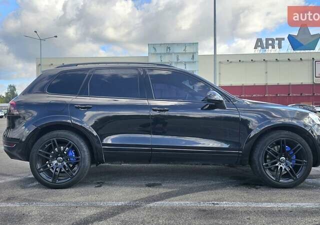 Черный Фольксваген Туарег, объемом двигателя 4.13 л и пробегом 335 тыс. км за 21500 $, фото 1 на Automoto.ua