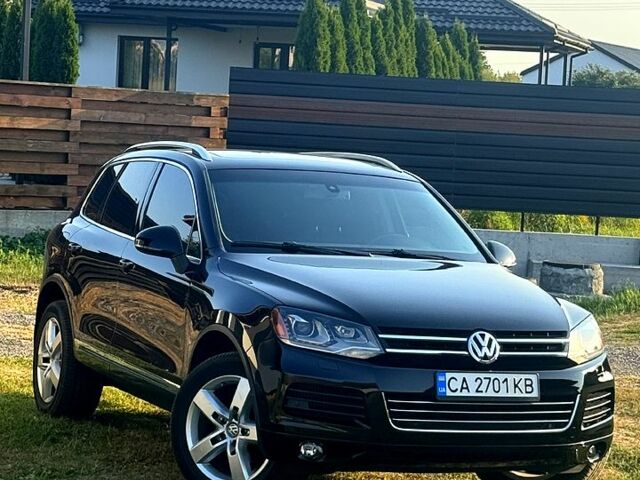 Черный Фольксваген Туарег, объемом двигателя 3 л и пробегом 184 тыс. км за 21800 $, фото 1 на Automoto.ua