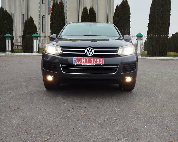 Черный Фольксваген Туарег, объемом двигателя 3 л и пробегом 252 тыс. км за 18600 $, фото 1 на Automoto.ua