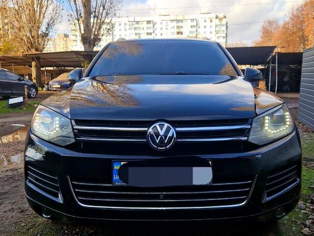 Черный Фольксваген Туарег, объемом двигателя 3 л и пробегом 227 тыс. км за 21000 $, фото 1 на Automoto.ua