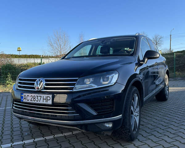 Черный Фольксваген Туарег, объемом двигателя 2.97 л и пробегом 225 тыс. км за 27500 $, фото 1 на Automoto.ua