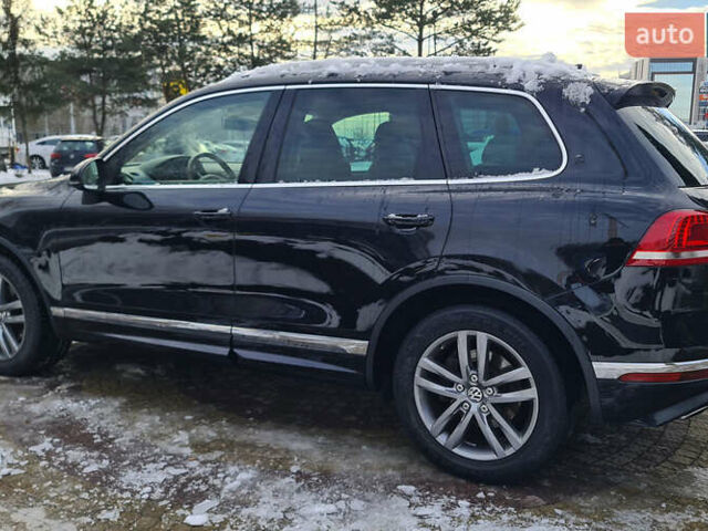 Чорний Фольксваген Туарег, об'ємом двигуна 3 л та пробігом 185 тис. км за 32999 $, фото 1 на Automoto.ua