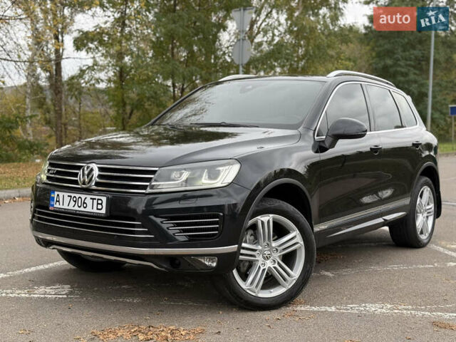 Черный Фольксваген Туарег, объемом двигателя 3 л и пробегом 237 тыс. км за 24900 $, фото 1 на Automoto.ua