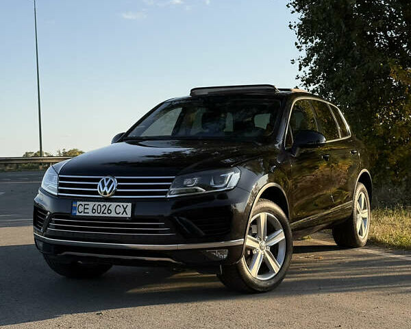 Черный Фольксваген Туарег, объемом двигателя 3 л и пробегом 219 тыс. км за 26900 $, фото 1 на Automoto.ua