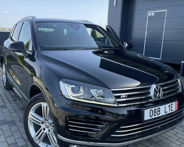 Черный Фольксваген Туарег, объемом двигателя 3 л и пробегом 266 тыс. км за 27990 $, фото 1 на Automoto.ua