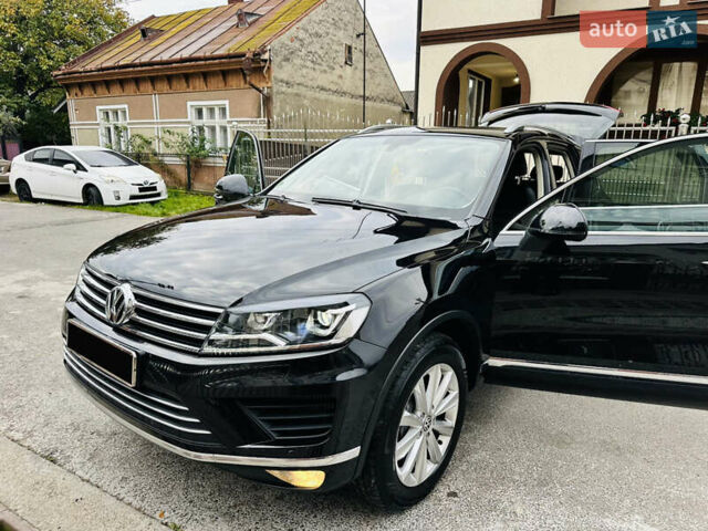 Черный Фольксваген Туарег, объемом двигателя 3 л и пробегом 286 тыс. км за 19900 $, фото 1 на Automoto.ua