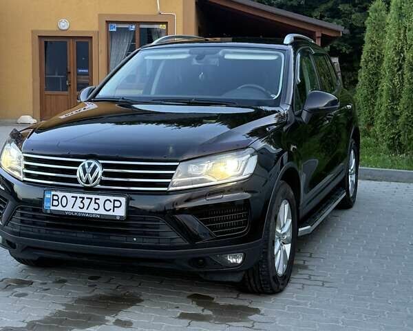 Черный Фольксваген Туарег, объемом двигателя 2.97 л и пробегом 285 тыс. км за 23500 $, фото 1 на Automoto.ua