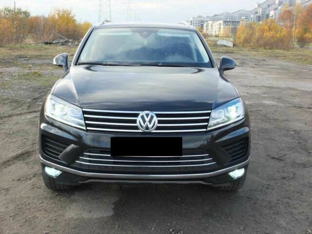 Чорний Фольксваген Туарег, об'ємом двигуна 3 л та пробігом 176 тис. км за 21600 $, фото 1 на Automoto.ua