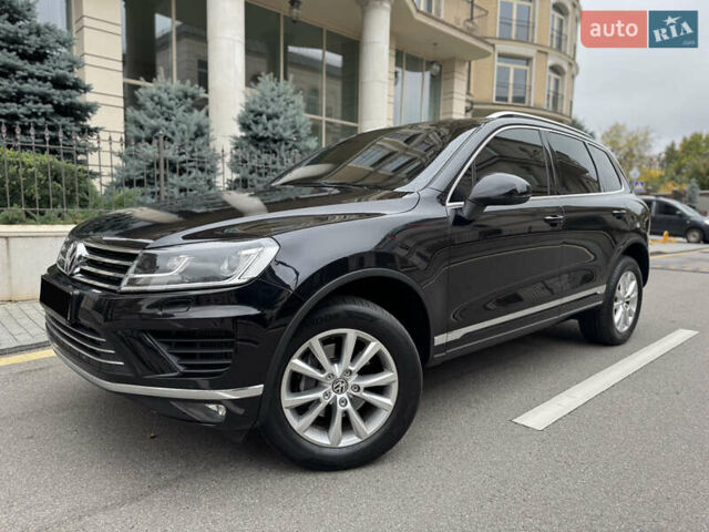 Черный Фольксваген Туарег, объемом двигателя 3 л и пробегом 159 тыс. км за 27900 $, фото 1 на Automoto.ua