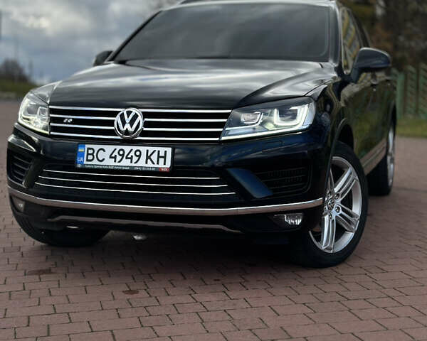 Черный Фольксваген Туарег, объемом двигателя 3 л и пробегом 231 тыс. км за 30500 $, фото 1 на Automoto.ua