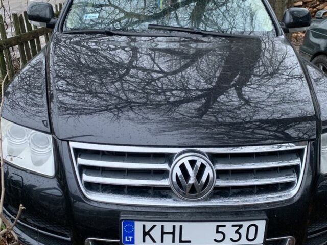 Черный Фольксваген Туарег, объемом двигателя 4.9 л и пробегом 230 тыс. км за 5450 $, фото 1 на Automoto.ua