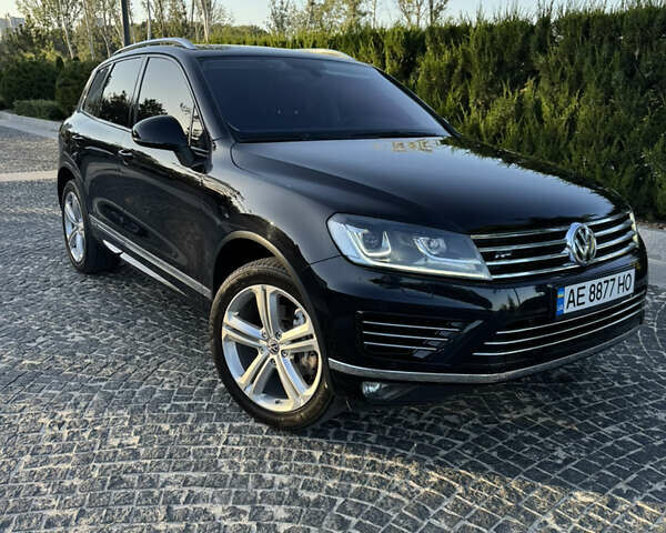 Черный Фольксваген Туарег, объемом двигателя 2.97 л и пробегом 128 тыс. км за 39900 $, фото 1 на Automoto.ua