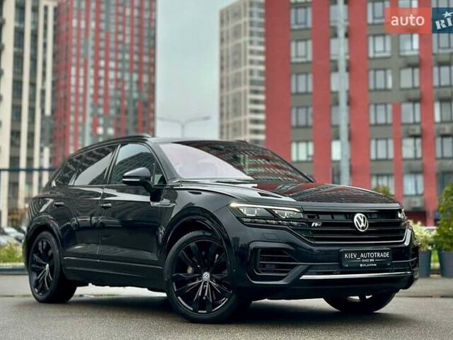 Черный Фольксваген Туарег, объемом двигателя 3 л и пробегом 141 тыс. км за 48500 $, фото 1 на Automoto.ua