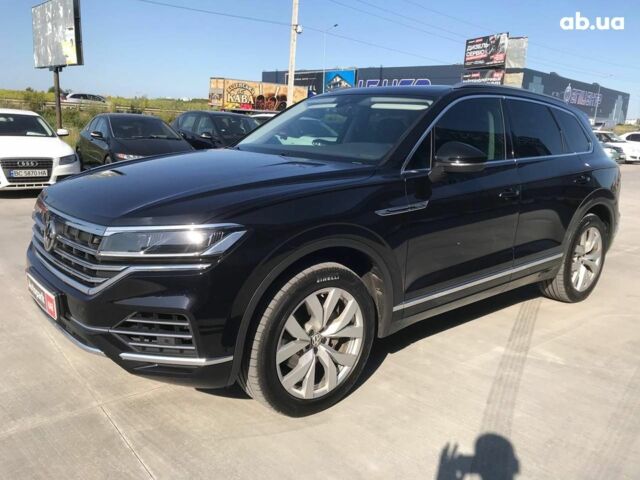Чорний Фольксваген Туарег, об'ємом двигуна 3 л та пробігом 119 тис. км за 49990 $, фото 1 на Automoto.ua