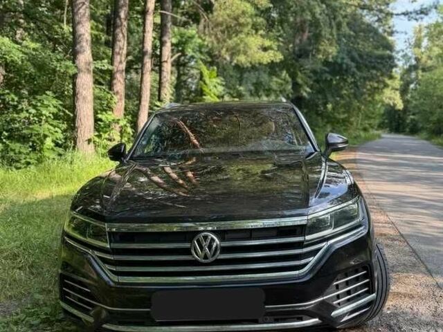 Черный Фольксваген Туарег, объемом двигателя 3 л и пробегом 75 тыс. км за 36000 $, фото 1 на Automoto.ua