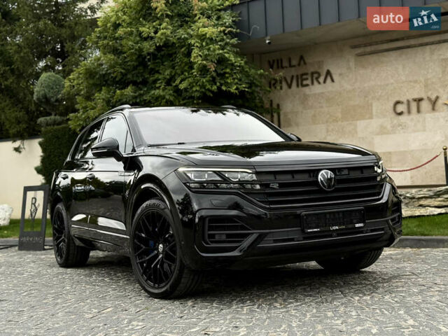 Чорний Фольксваген Туарег, об'ємом двигуна 3 л та пробігом 143 тис. км за 57900 $, фото 1 на Automoto.ua