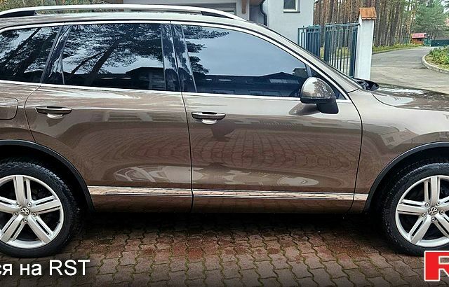 Коричневий Фольксваген Туарег, об'ємом двигуна 3 л та пробігом 152 тис. км за 24000 $, фото 1 на Automoto.ua