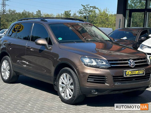 Коричневый Фольксваген Туарег, объемом двигателя 3 л и пробегом 266 тыс. км за 18500 $, фото 1 на Automoto.ua