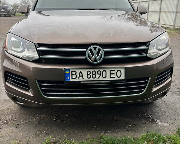 Коричневый Фольксваген Туарег, объемом двигателя 3 л и пробегом 204 тыс. км за 17400 $, фото 1 на Automoto.ua