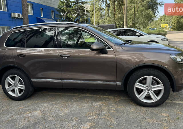 Коричневый Фольксваген Туарег, объемом двигателя 3 л и пробегом 230 тыс. км за 19200 $, фото 1 на Automoto.ua