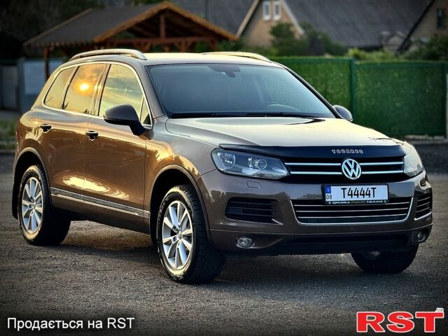 Коричневый Фольксваген Туарег, объемом двигателя 3 л и пробегом 236 тыс. км за 18000 $, фото 1 на Automoto.ua