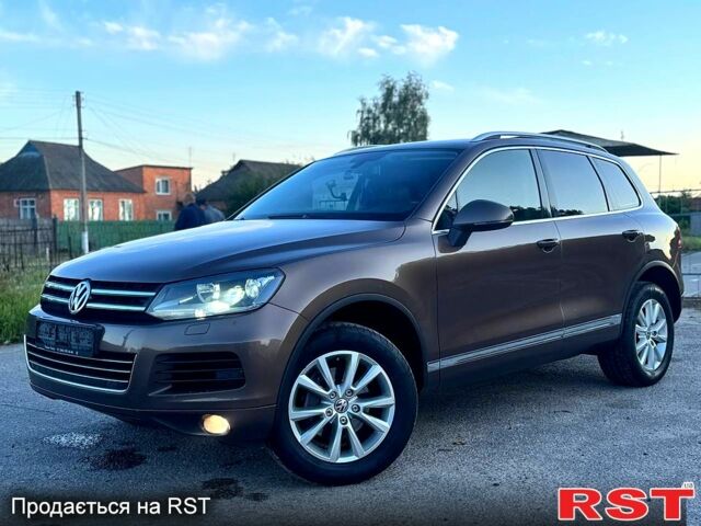 Коричневый Фольксваген Туарег, объемом двигателя 3 л и пробегом 193 тыс. км за 15499 $, фото 1 на Automoto.ua