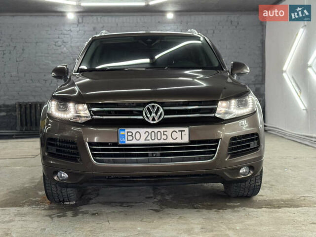 Коричневый Фольксваген Туарег, объемом двигателя 2.97 л и пробегом 300 тыс. км за 21300 $, фото 1 на Automoto.ua