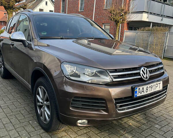 Коричневый Фольксваген Туарег, объемом двигателя 3 л и пробегом 175 тыс. км за 19000 $, фото 1 на Automoto.ua