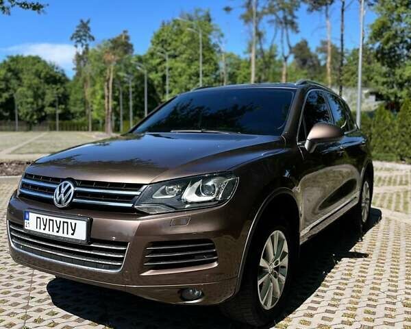 Коричневий Фольксваген Туарег, об'ємом двигуна 2.97 л та пробігом 190 тис. км за 24200 $, фото 1 на Automoto.ua