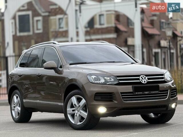 Коричневый Фольксваген Туарег, объемом двигателя 2.97 л и пробегом 144 тыс. км за 28500 $, фото 1 на Automoto.ua
