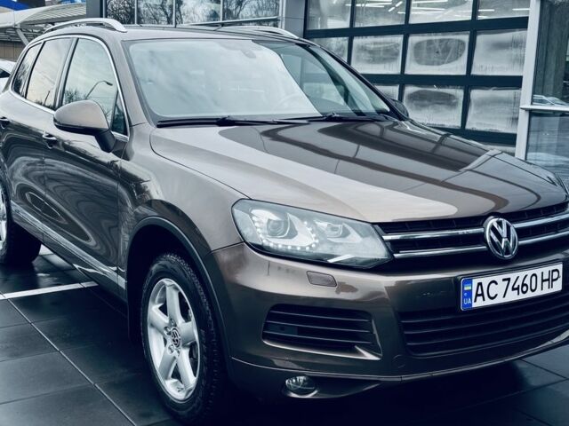 Коричневый Фольксваген Туарег, объемом двигателя 3 л и пробегом 217 тыс. км за 22000 $, фото 1 на Automoto.ua