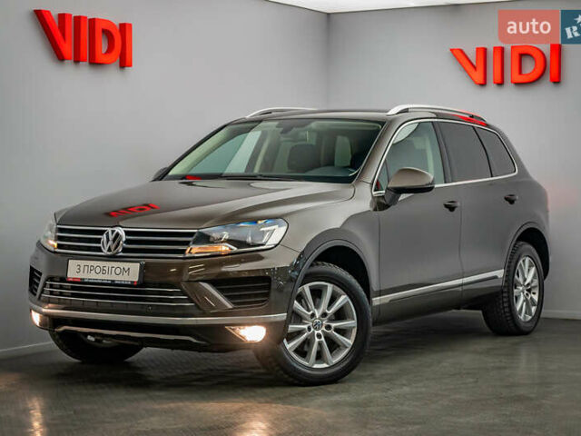 Коричневый Фольксваген Туарег, объемом двигателя 3 л и пробегом 100 тыс. км за 22796 $, фото 1 на Automoto.ua
