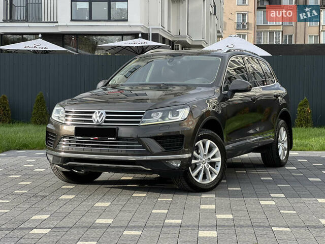 Коричневый Фольксваген Туарег, объемом двигателя 3 л и пробегом 220 тыс. км за 29800 $, фото 1 на Automoto.ua