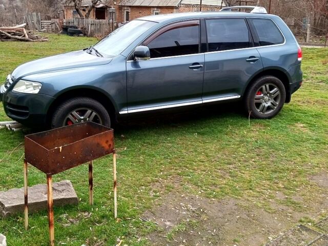 Сірий Фольксваген Туарег, об'ємом двигуна 4.2 л та пробігом 216 тис. км за 5000 $, фото 1 на Automoto.ua