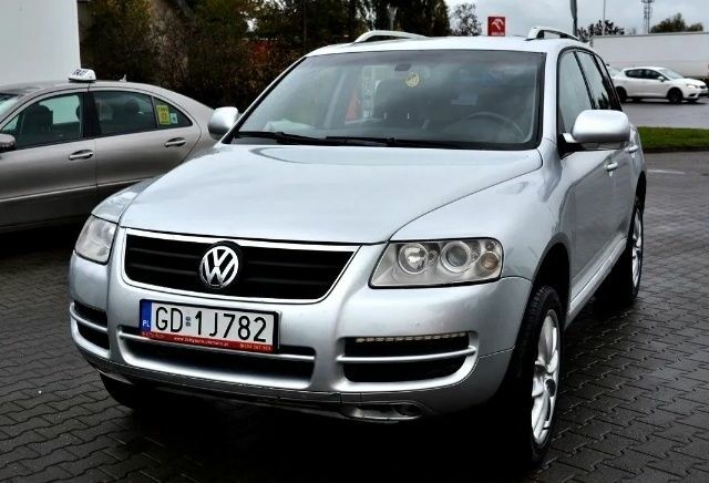 Серый Фольксваген Туарег, объемом двигателя 2 л и пробегом 1 тыс. км за 3200 $, фото 1 на Automoto.ua