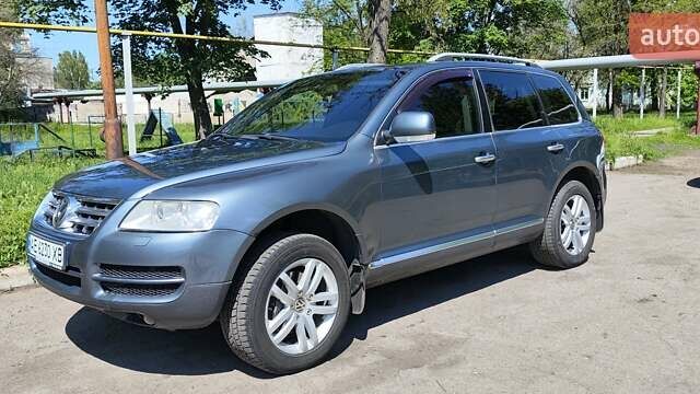 Серый Фольксваген Туарег, объемом двигателя 3.19 л и пробегом 503 тыс. км за 7700 $, фото 1 на Automoto.ua