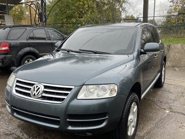 Серый Фольксваген Туарег, объемом двигателя 2.5 л и пробегом 280 тыс. км за 5299 $, фото 1 на Automoto.ua