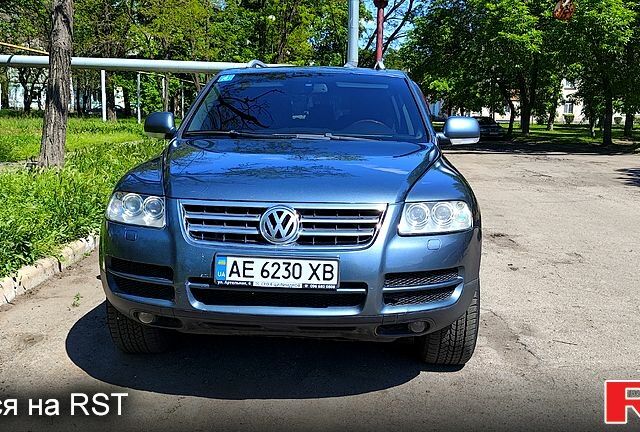 Сірий Фольксваген Туарег, об'ємом двигуна 3.2 л та пробігом 503 тис. км за 7700 $, фото 1 на Automoto.ua