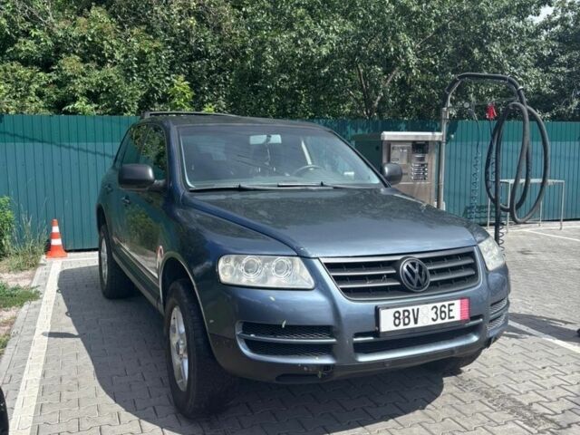 Фольксваген Туарег 2004 в Славянске на Automoto.ua Серый Фольксваген Туарег, объемом двигателя 2.5 л и пробегом 270 тыс. км за 4650 $, фото 1 на Automoto.ua