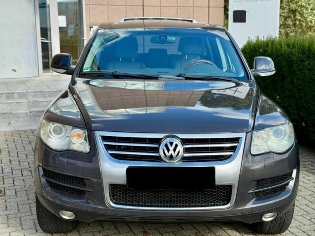 Серый Фольксваген Туарег, объемом двигателя 3 л и пробегом 213 тыс. км за 3455 $, фото 1 на Automoto.ua